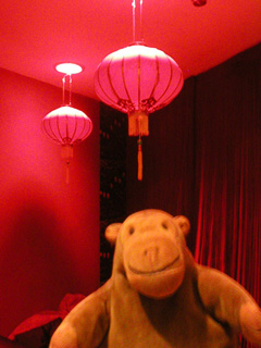 Mr Monkey looking at Karen Tam's completed opium den