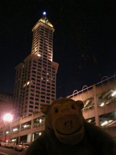 Mr Monkey looking at the Sinking Ship and the Smith Tower