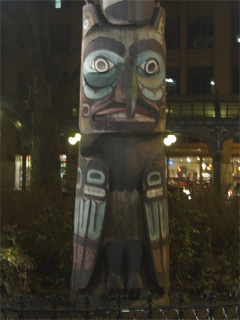 Grandfather of Raven, lowest figure on the Pioneer Square totem pole