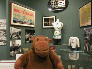 Mr Monkey looking at a display about the World's Fair
