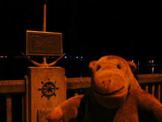 Mr Monkey looking at the Great White Fleet plaque
