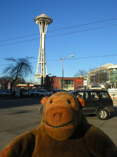 Mr Monkey looking at the Space Needle from Second Avenue