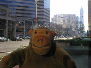 Mr Monkey looking down Second Avenue towards the Dexter Horton Building