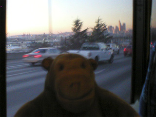 Mr Monkey looking out of the bus on the journey back to Seattle