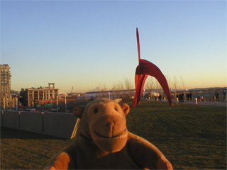 Mr Monkey looking at Alexander Calder's Eagle from a distance