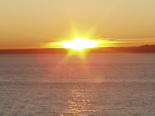 The sun setting in Puget Sound