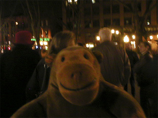 Mr Monkey in a group of people in Pioneer Square