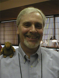 Mr Monkey sitting on Stephen Booth's shoulder