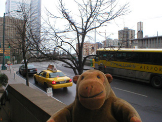 Mr Monkey about to catch a taxi outside the Renaissance Madison