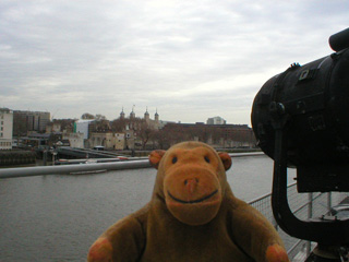 Mr Monkey looking at the the Tower of London from the Flag Deck