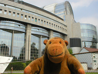 Mr Monkey looking at the back of the European Parliament