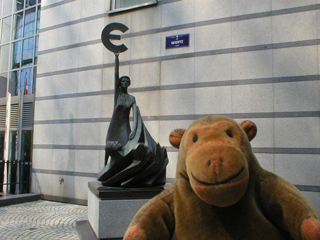 Mr Monkey outside the front door of the European Parliament