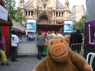 Mr Monkey watching an open air jazz concert in the Place St. Catherine