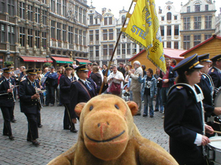 Mr Monkey watching a Belgian brass band
