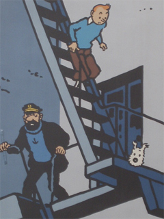A mural showing TinTin, Snowy and Captain Haddock on a fire escape