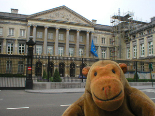 Mr Monkey looking at the Palais de la Nation