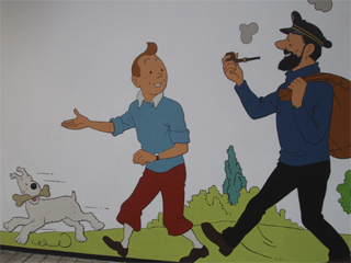 TinTin, Snowy and Captain Haddock hiking at the start of the mural
