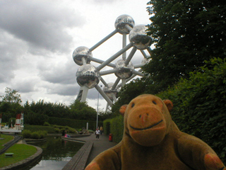 Mr Monkey looking at the Atomium from Mini-Europe