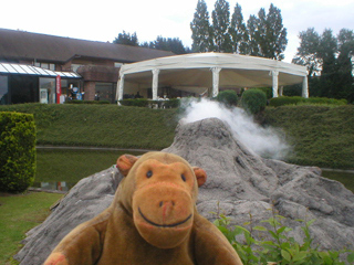 Mr Monkey looking at Vesuvius with steam coming out