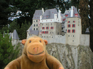 Mr Monkey looking at Eltz Castle