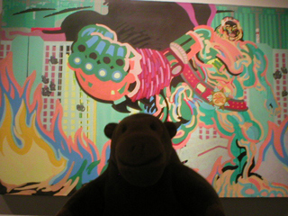 Mr Monkey looking at the central panel of Romance of the Three Dynasties
