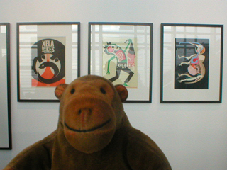 Mr Monkey looking at Roger Bailey's club posters