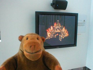 Mr Monkey looking at a video by Michael England