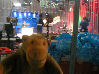Mr Monkey watching Channel m filming a music programme