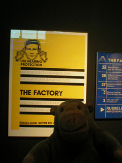 Mr Monkey looking at the FAC 1 poster