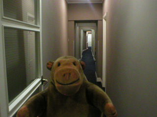 Mr Monkey in the long corridor inside the Studley
