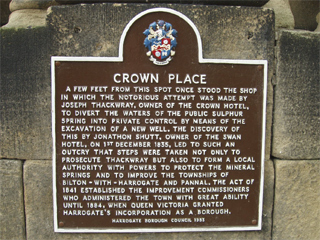 A plaque detailing the wickedness of the owner of the Crown