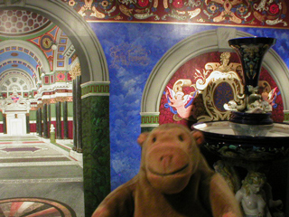Mr Monkey examining a recreation of the Royal Baths