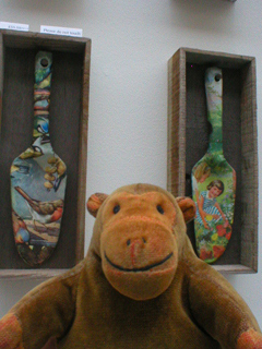 Mr Monkey looking at Magie Hollingworth's decorative trowels