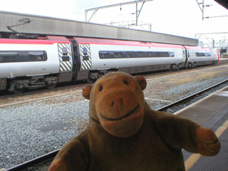 Mr Monkey at a train at Stockport station