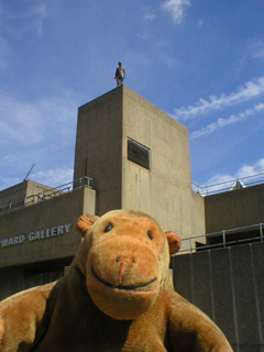 Mr Monkey looking at an Event Horizon figure on top of the Hayward