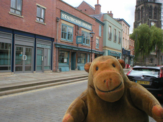 Mr Monkey looking along Market Place to St Mary's church