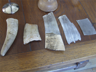 Pieces of horn showing the stages needed to make the panes of a lantern