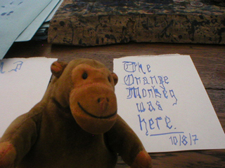 Mr Monkey with his message 'The Orange Monkey was here'