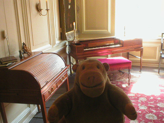 Mr Monkey looking around the 19th century parlour