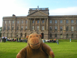 Mr Monkey watching the audience picnic in front of Lyme Hall
