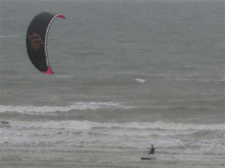 A parasurfer in the surf at Ostende