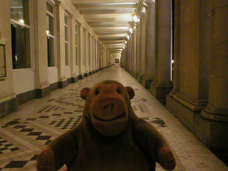 Mr Monkey in the colonnaded gallery along the sea front of the Thermae Palace