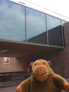 Mr Monkey looking at up at the new restaurant