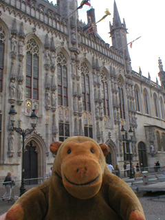 Mr Monkey looking at the Stadhuis of Bruges