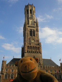 Mr Monkey looking at the Belfort of Bruges