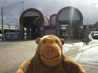 Mr Monkey looking at the tram and bus cleaning sheds