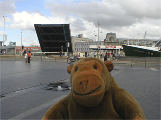 Mr Monkey watching the half lowered drawbridge