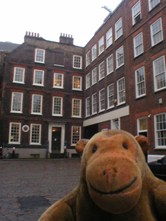 Mr Monkey looking across Gough Square to Dr Johnson's House