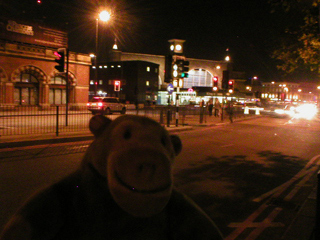 Mr Monkey across the road from King's Cross at night