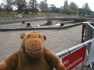 Mr Monkey looking at the inactive Italian fountains